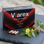 Cápsulas de Viarex con tribulus terrestris, zinc y L-arginina sobre fondo neutro